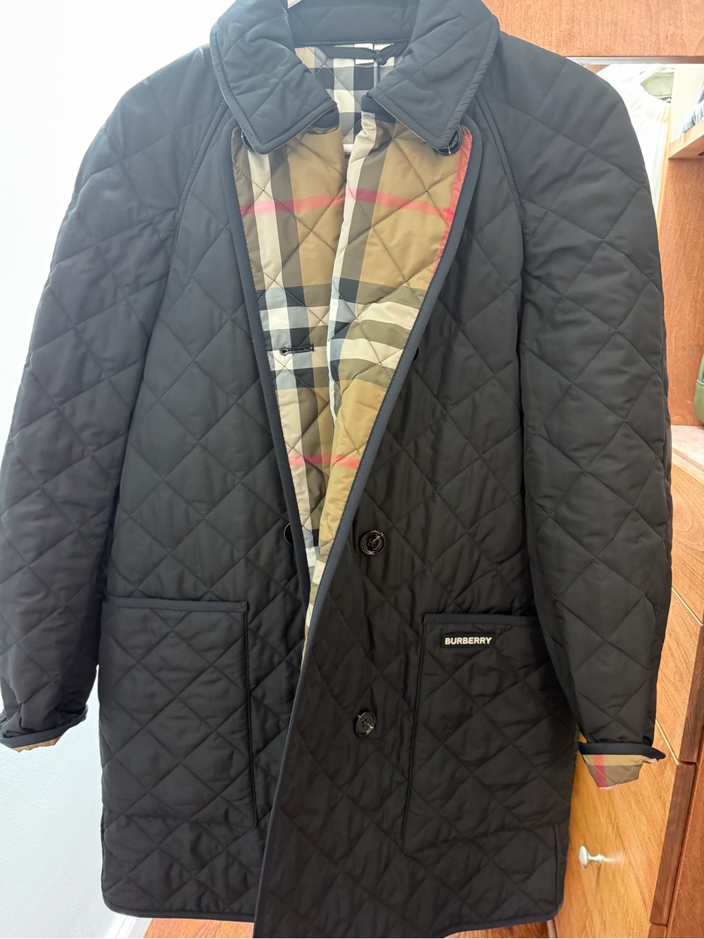 Burberry Women’s Black Quilted Coat with Signature Check Lining